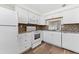 White kitchen with microwave, oven, and dishwasher at 4220 Sheldon Pl # 4220, New Port Richey, FL 34652