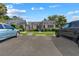 Two-unit building with parking in front, in a residential neighborhood at 4220 Sheldon Pl # 4220, New Port Richey, FL 34652