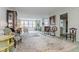 Spacious living room with water views and ample natural light at 5200 Brittany S Dr # 1708, St Petersburg, FL 33715
