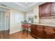 Bright kitchen with granite countertops and wood cabinets at 5200 Brittany S Dr # 1708, St Petersburg, FL 33715