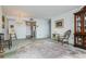 Living room with hardwood floors and a large area rug at 5200 Brittany S Dr # 1708, St Petersburg, FL 33715