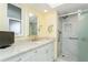 Updated bathroom with a large shower and granite vanity at 5200 Brittany S Dr # 1708, St Petersburg, FL 33715