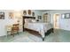 Cozy bedroom with a wooden bed frame and desk at 5200 Brittany S Dr # 1708, St Petersburg, FL 33715
