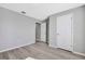 Spacious bedroom with neutral walls and wood-look floors at 6731 Wirevine Dr, Brooksville, FL 34602