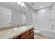 Clean bathroom with tub, toilet, and vanity at 6731 Wirevine Dr, Brooksville, FL 34602