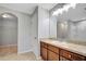 Bathroom with vanity, sink, and walk-in shower at 6731 Wirevine Dr, Brooksville, FL 34602