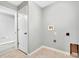 Convenient laundry room with hookups and extra storage at 6731 Wirevine Dr, Brooksville, FL 34602