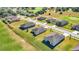 Houses on a street next to a golf course at 6731 Wirevine Dr, Brooksville, FL 34602