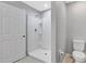 Clean bathroom featuring a shower and toilet at 6731 Wirevine Dr, Brooksville, FL 34602