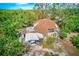 Aerial view of dome house with storm damage to roof at 7923 18Th E Ave, Palmetto, FL 34221