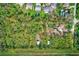 Aerial view of property showing home and surrounding land at 7923 18Th E Ave, Palmetto, FL 34221