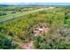 Aerial view showcasing the home's location near a highway at 7923 18Th E Ave, Palmetto, FL 34221