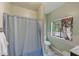 Bathroom with shower/tub combo and toilet at 7923 18Th E Ave, Palmetto, FL 34221