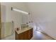 Small bathroom with wooden vanity and a mirror at 7923 18Th E Ave, Palmetto, FL 34221