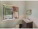 Small bathroom with a single vanity, sink, and window at 7923 18Th E Ave, Palmetto, FL 34221