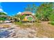 Unique dome-shaped home with carport and large yard at 7923 18Th E Ave, Palmetto, FL 34221