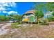 Single Gathering home with carport and landscaping at 7923 18Th E Ave, Palmetto, FL 34221