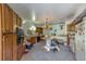 View of a kitchen with an island and wood cabinets at 7923 18Th E Ave, Palmetto, FL 34221