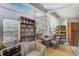 Home office with built-in shelving and ample natural light at 7923 18Th E Ave, Palmetto, FL 34221