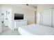 Bedroom with queen bed, dresser, and view of hallway at 9980 Gulf Blvd # 614, St Petersburg, FL 33706