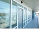 Condo hallway with ocean views and access to rooms at 9980 Gulf Blvd # 614, St Petersburg, FL 33706