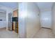 Home entryway with tile flooring and kitchen view at 10100 Sailwinds N Blvd # 106, Largo, FL 33773