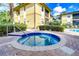 Community hot tub and well-maintained landscaping at 10100 Sailwinds N Blvd # 106, Largo, FL 33773