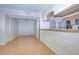 Open-concept dining and kitchen area with bamboo flooring at 10100 Sailwinds N Blvd # 106, Largo, FL 33773