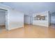 Open floor plan featuring bamboo flooring, natural lighting, and neutral color palette at 10100 Sailwinds N Blvd # 106, Largo, FL 33773