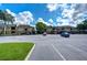A well-maintained parking lot with covered parking for residents and guests at 10100 Sailwinds N Blvd # 106, Largo, FL 33773