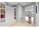 Convenient laundry room with built-in cabinets and shelving at 11101 58Th Street E Cir, Parrish, FL 34219
