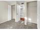 Bright bedroom with double closets and access to the bathroom at 1127 Pine Ridge W Cir # A2, Tarpon Springs, FL 34688