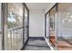 Screened balcony overlooking a tree-lined area at 1127 Pine Ridge W Cir # A2, Tarpon Springs, FL 34688