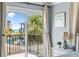 Bedroom balcony with sliding doors offering a stunning ocean view at 19807 Gulf Blvd # 128, Indian Shores, FL 33785