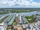 Aerial view shows property near waterway and beach at 19807 Gulf Blvd # 128, Indian Shores, FL 33785