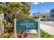 Bayview Villas community sign in front of lush landscaping at 19807 Gulf Blvd # 128, Indian Shores, FL 33785