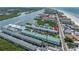 Aerial view of condo community near beach, highlighting one unit at 19807 Gulf Blvd # 128, Indian Shores, FL 33785