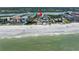 Aerial view highlighting beachfront home near waterway at 19807 Gulf Blvd # 128, Indian Shores, FL 33785