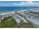 Aerial view highlighting beach property and its surroundings at 19807 Gulf Blvd # 128, Indian Shores, FL 33785