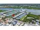 Aerial view showcasing the property and its waterfront proximity at 19807 Gulf Blvd # 128, Indian Shores, FL 33785
