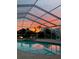 Stunning sunset reflected in the pool at 2009 Captiva Ct, Sun City Center, FL 33573