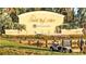 Sun City Center community entrance with golf cart at 2421 E Del Webb Blvd, Sun City Center, FL 33573