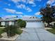 Charming single-story home with a two-car garage at 2421 E Del Webb Blvd, Sun City Center, FL 33573