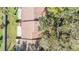 Overhead view of home showcasing roofline and landscaping at 2582 Bentley Dr, Palm Harbor, FL 34684