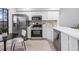Modern kitchen with white cabinets and stainless steel appliances at 2582 Bentley Dr, Palm Harbor, FL 34684