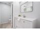 Bathroom with vanity, toilet and walk-in shower at 2582 Bentley Dr, Palm Harbor, FL 34684