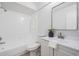 Bathroom with tub, toilet and vanity at 2582 Bentley Dr, Palm Harbor, FL 34684