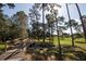 Wooden footbridge over a small creek at 2582 Bentley Dr, Palm Harbor, FL 34684