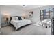 Main bedroom with king-size bed and large window at 2582 Bentley Dr, Palm Harbor, FL 34684