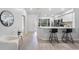Modern kitchen with white cabinets, stainless steel appliances, and quartz countertops at 2582 Bentley Dr, Palm Harbor, FL 34684